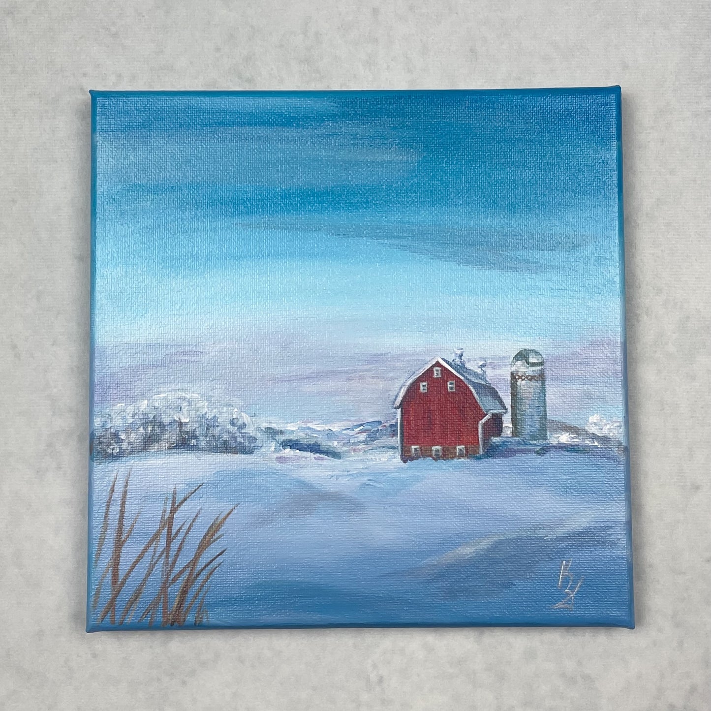 Red Barn in snowy hills. Print
